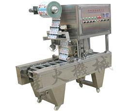 塑料(liao)盒全(quan)自(zi)動(dong)封口機(ji)